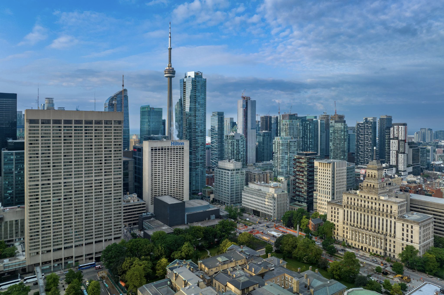 Lower Borrowing Costs Seen Lightening Debt Burden on Canadian Real Estate Industry